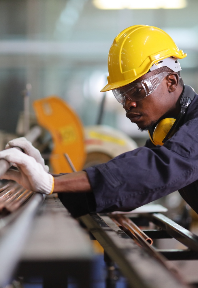 Worker in a metal factory